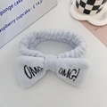 Light blue plush OMG! bow headband for washing face and skincare routines - Sky Blue