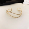 Detail showing the double-layered wavy lines and polished gold finish of the open bangle - Double-Layer Wave Style (5#) / Gold
