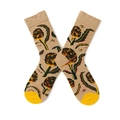 Detail of khaki crew socks featuring colorful artichoke patterns and yellow heel accents - One Size / Pine Cone
