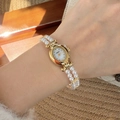 Vintage goldene ovale Armbanduhr mit weißem Perlenarmband und elegantem Zifferblatt - Goldgehäuse Weißes Zifferblatt