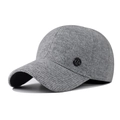 Close-up of dark grey knitted baseball cap featuring a textured fabric and 'M' logo - Adjustable / Gray