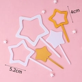 Star-shaped cake toppers in gold and white colors, 4cm and 5.2cm width, on pink background - White Acrylic Star Set