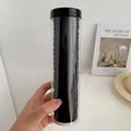 Black high-elastic seamless hair ties stored in a clear cylindrical plastic container - 20 Pieces Canned / Black