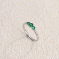 Vintage silver titanium steel ring with three green gemstones in a classic prong setting - Silver With Green Zircon