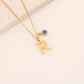 Collier en acier inoxydable doré avec lettre R majuscule et breloque œil bleu - Lettre R