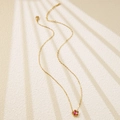 Chic gold necklace featuring a delicate pink five-petal flower pendant on cream background - Pink Flower Pendant Necklace (BD023-rose-red)