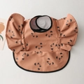 Waterproof baby feeding bib in coral pink with panda print and ruffle sleeve detail - Wings - Brown Panda / One Size