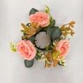 Artificial candle ring featuring peach pink roses and green leaves for festive table decor - Champagne Pink