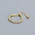 Adjustable S925 silver ring in gold with sparkling pavé cubic zirconia row detail - Adjustable Open / Golden (White Stone)