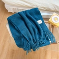 Dark blue knitted wool scarf for women featuring a handmade label and elegant tassels - Blue