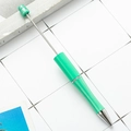 DIY plastic beaded ballpoint pen in bright green finish with metal accents - Teal
