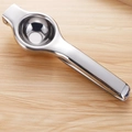 Manual stainless steel lemon squeezer with polished silver finish on a wooden background - Regular Style Lemon Squeezer (Bagged)