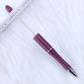 Deep purple pearl resin DIY beadable pen with silver metal rod and cone tip on white fur - Princess Red