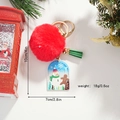 Llavero navideño de muñeco de nieve con pompón rojo y borla verde en fondo blanco - Pompón de Navidad Muñeco de Niever