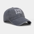 Detailed close-up of embroidered DOG DAD text and paw print on washed cotton baseball cap - One Size / Gray