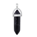 Macro shot of a black natural stone hexagonal point pendant with silver metal clasp - Synthetic Black Turquoise