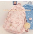 Detail of cute bear print backpacks in pink and blue with plush cat paw charms - No Charms / Pink