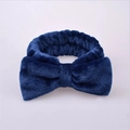Navy blue fluffy coral fleece headband with large bow for skincare and makeup - Navy Blue
