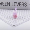 Glow-in-the-dark purple expression bottle keychain with heart eye smile and mini stir bar - Purple