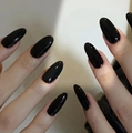 Glossy black long almond press-on nails with a polished mirror finish on hands - Glossy Black Long Oval Style (CW256) / 24 Pcs/Set