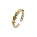 Detailed view of golden chain link ring with a yellow star charm and open adjustable design - Adjustable Open / Yellow