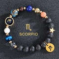 Solar system beaded bracelet featuring Scorpio charm and blue sandstone planets - Scorpio-Lava Stone