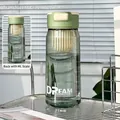 Translucent green 700ml water bottle with tea filter and milliliter measurement scales - Green