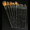 Detailed view of 12 luxury makeup brushes with black rhinestone handles and silver ferrules - 12pcs Set / Black