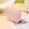 Pink quilted travel toiletry bag with diamond pattern and secure top zipper closure - Trapezoid Bag / Pink