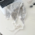 Detailed view of floral cotton neckerchief with white crochet lace edging and blue prints - Small Floral Beige Base