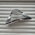 Close-up of a silver triangular metal hair claw clip on beige ribbed fabric background - Triangle Silver 11cm