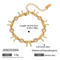 Macro detail of 18K gold stainless steel bow bracelet with length and material specs - Bow Knot Zircon Bracelet