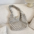 Sac fourre-tout en polaire blanc cassé à motifs cœurs bleus sur canapé doux - Bleu Beige