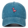 Macro shot of a washed blue denim baseball cap featuring pink flamingo embroidery - Adjustable / Lake Blue