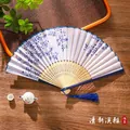 Chinese blue and white porcelain style folding fan with natural bamboo frame and blue tassel - 17 Fresh Elegant