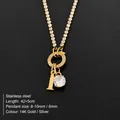 Elegant stainless steel necklace with sparkling crystal and letter I charm in gold finish. - Letter I (XNL0103)
