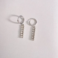 Silver stainless steel hoop earrings with crystal bar pendants on a white leather base - Silver + White (DEP1397)