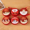 Set of six red round Christmas tinplate coin purses with festive cartoon illustrations - Round Christmas B