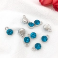Blue gemstone pendants with silver alloy base for DIY jewelry making in a scattered layout - Antique Silver December - Dark Blue