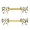 Piercings de téton en forme de nœud doré avec pavé de zircons sur fond blanc - Nœud Or