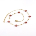 Gold-tone stainless steel chain necklace with small red crystal flowers and heart charm - Dark Red Necklace