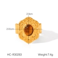 Detailansicht eines Vintage-Stahlrings mit Blumenrelief und Tigerauge-Inlay - Breite Oberflächen-Stil(HC-R30283)