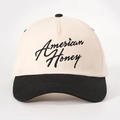 Klassische cremeweiße Baseballkappe mit schwarzem Schirm und Stickerei American Honey - Creme/Schwarz