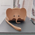 Brown leather elephant-shaped coin purse with litchi grain texture and zipper closure - Khaki