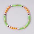 Pulsera bohemia hecha a mano con cuentas de colores y cilindros dorados únicos - Cuentas de Columna Oro Multicolores