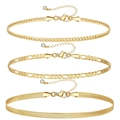 Three-piece golden layering bracelet set with Cuban, Figaro and snake chains and zircon charms - Golden Cuban, Figaro and Snake Chain Set