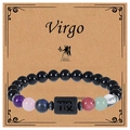 Detailed macro shot of Virgo zodiac handmade beaded bracelet on kraft paper gift card - Virgo