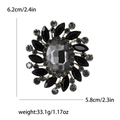 Vintage sunburst brooch with grey oval gemstone and black marquise crystals in gold finish - Black