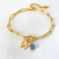 14K vergulde roestvrijstalen armband met de letter W en blauwe edelsteen hanger - Letter W / Staalkleur