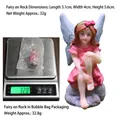 Pink fairy figurine sitting on stone, resin garden ornament, size 3.1x4x5.6cm - Fairy Sitting on Stone